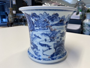 A fine Chinese blue, white and copper red 'Master of the Rocks' brush pot, Kangxi